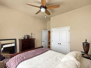 2nd bedroom on the main floor with a large window and beautiful view of the yard and mountains.