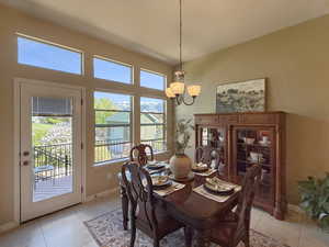 Elegant dining space, large windows for calming natural light and breathtaking views of the mountains.