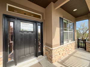 Covered front porch and beautiful foyer entry.