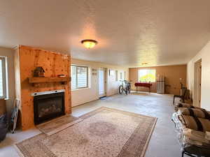 Spacious daylight basement living room with separate entrance walk-out. Plumbed for a kitchen and ready for finishing touches.