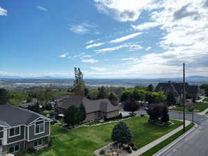Spacious corner lot with stunning views of the valley and mountains from every angle.