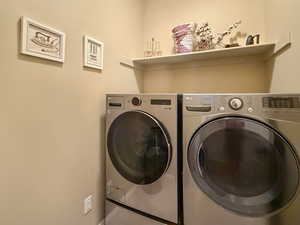 Laundry room with included washer and dryer.