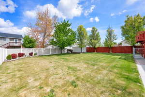 View of yard with a fenced backyard