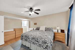 Bedroom featuring a ceiling fan and wood finished floors