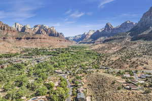 View of mountain backdrop with nearby suburban area