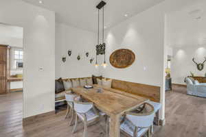 Dining room featuring recessed lighting and light wood-style flooring