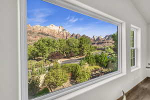 Detailed view of a mountain backdrop and wood finished floors