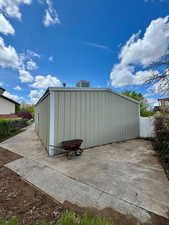 View of outdoor structure with fence