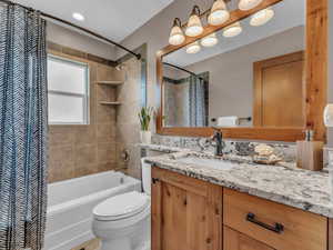 Updated craftsman bathroom highlights the same quality counters as the kitchen