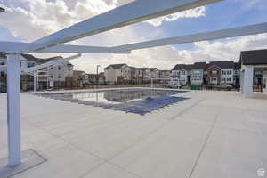 Pool featuring a residential view