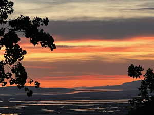 Sunset, mountains, water from the deck