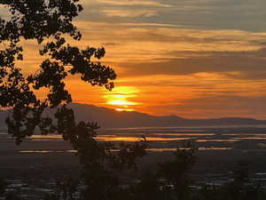 Sunset, mountains, water from the deck