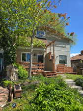 View of front of property featuring a deck
