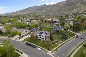 Aerial view featuring a residential view and a mountain view