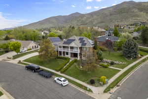 Drone / aerial view featuring a residential view and a mountain view