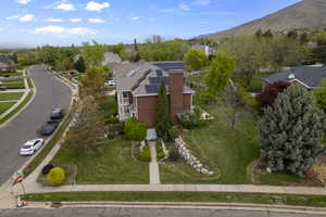 Drone / aerial view featuring a mountain view and a residential view