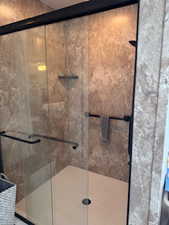 Bathroom with a shower stall