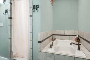 Full bath with a whirlpool tub