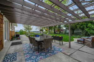 View of patio / terrace with outdoor dining space, a pergola, a fenced backyard, cooling unit, and an outdoor living space