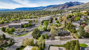 Aerial view featuring a mountain view and a residential view
