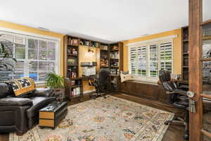 Office space with wood finished floors