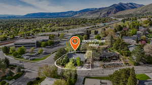 Drone / aerial view featuring a mountain view