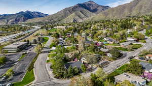 Birds eye view of property featuring a residential view and a mountain view