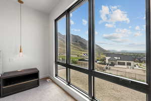 Interior space featuring visible vents and a mountain view