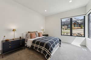 Bedroom with carpet floors, recessed lighting, baseboards, and visible vents