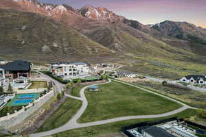 Aerial view at dusk featuring a mountain view