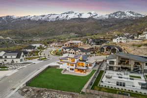 Drone / aerial view with a residential view and a mountain view