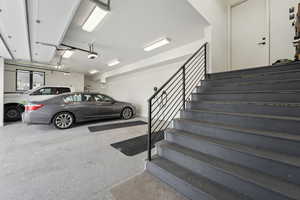 Staircase featuring speckled floor