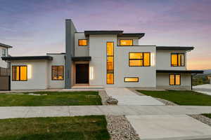 Contemporary home with a lawn
