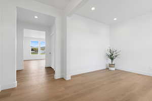 Entry with recessed lighting, baseboards, and hardwood finished floors