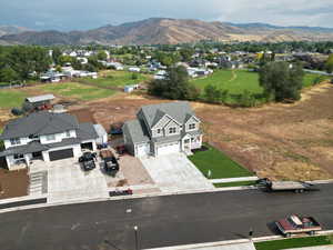 Aerial view of residential area with mountains