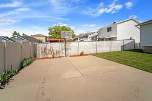 View of patio / terrace with a fenced backyard and a residential view
