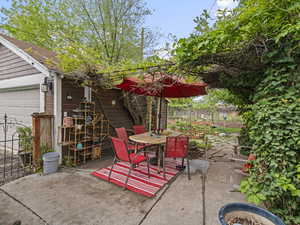View of patio / terrace with fence and outdoor dining space