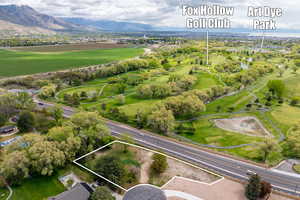 Bird's eye view featuring a mountain view and golf course view