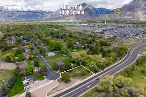 Drone / aerial view featuring a residential view and a mountain view
