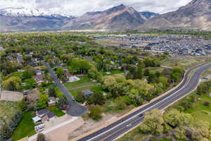 Birds eye view of property with a residential view and a mountain view