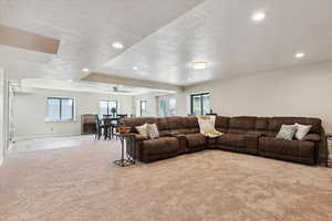 Large basement living area open to dining area in walk out basement