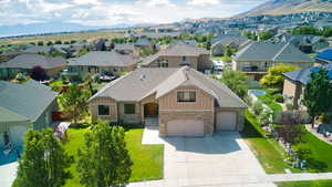 Bird's eye view with of the home and stunning mountain view.