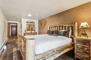 Bedroom featuring wood finished floors
