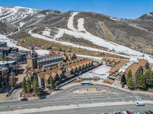 Snowy aerial view with a mountain view