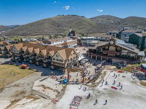 Birds eye view of property with a mountain view