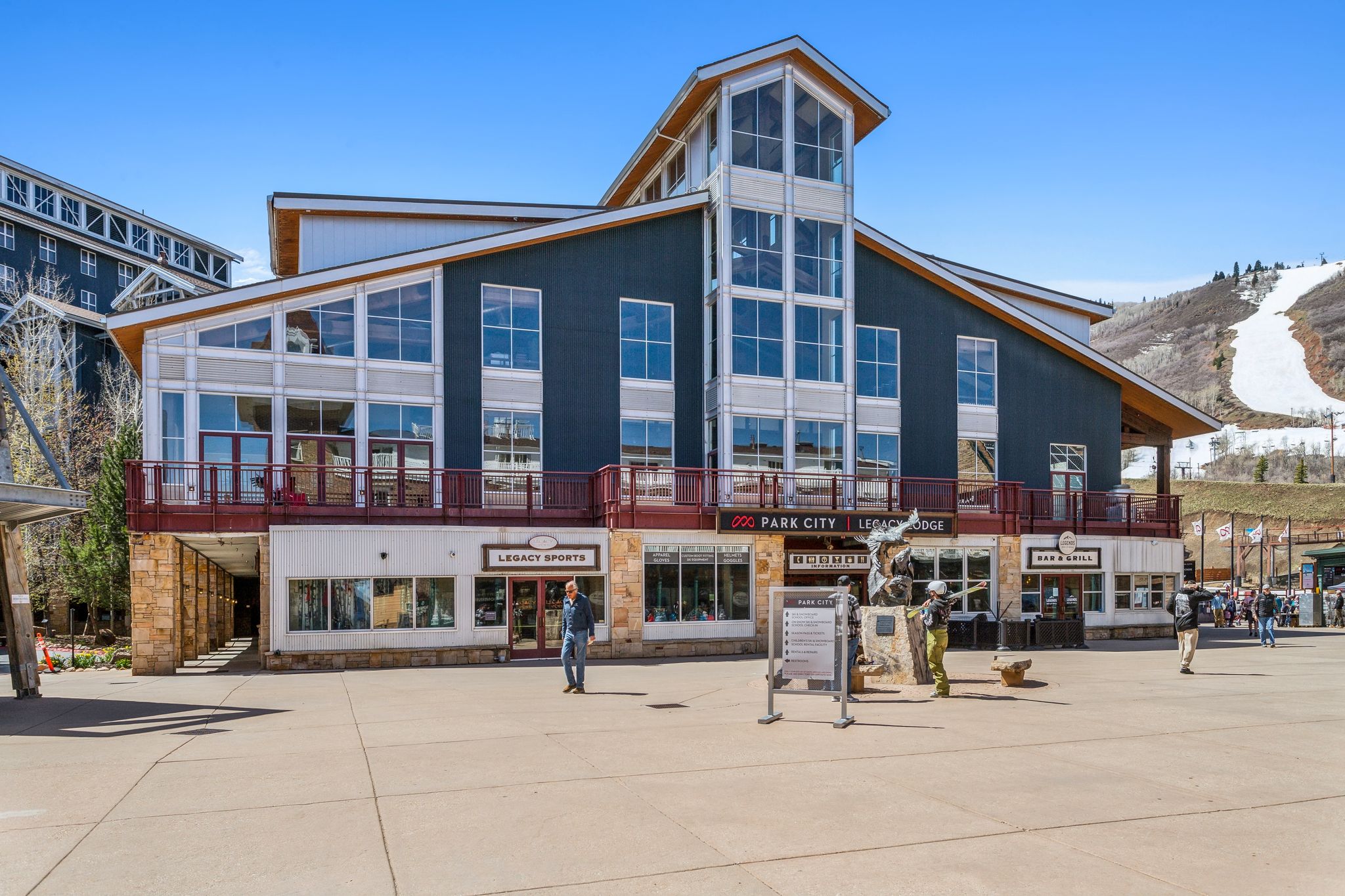 Exterior space featuring a mountain view and stone siding