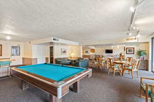 Game room featuring carpet floors, rail lighting, billiards, and visible vents