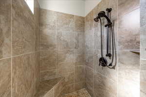 Bathroom with tiled shower