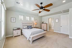 Bedroom featuring visible vents, recessed lighting, baseboards, and light colored carpet