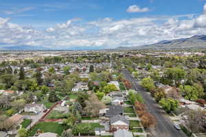 Drone / aerial view featuring a mountain view and a residential view